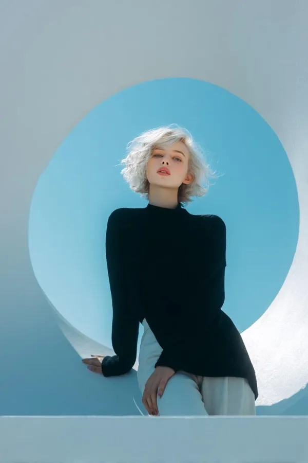 High Fashion Portrait of a Platinum Bob in Minimalist Futuristic Architecture
