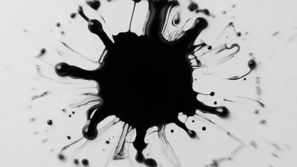 黒インクの滴が広がりAZED AIの文字を形成する白背景アニメーション