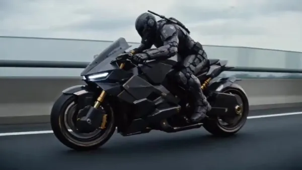 Futuristic Armored Rider Speeds on a Black-Gold Sci-Fi Motorcycle Down an Empty…